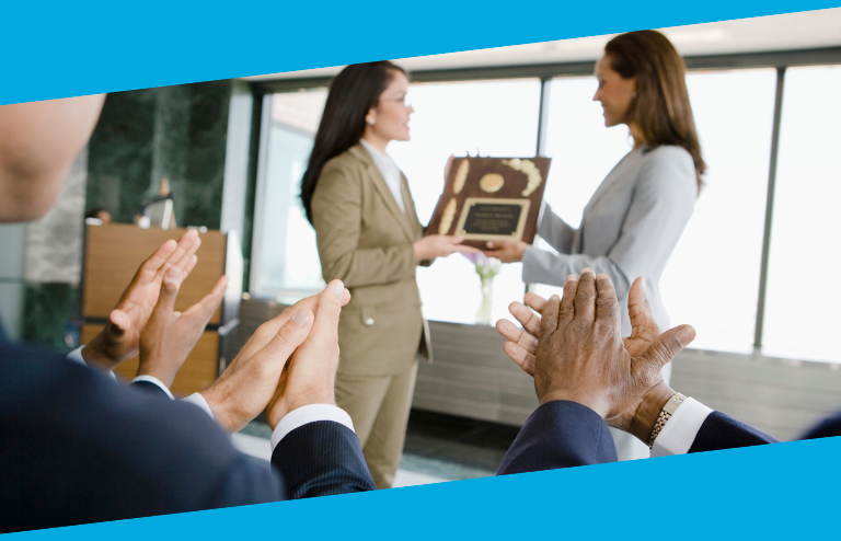 Woman receiving an award